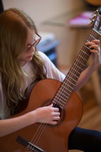 Guitar Student Playing