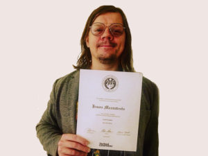 DalMaestro Student holding The Royal Conservatory Certificate
